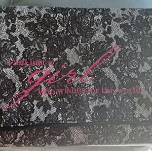 Marilyn Monroe Black Lace Patterned Travel Bag with Pink Text.